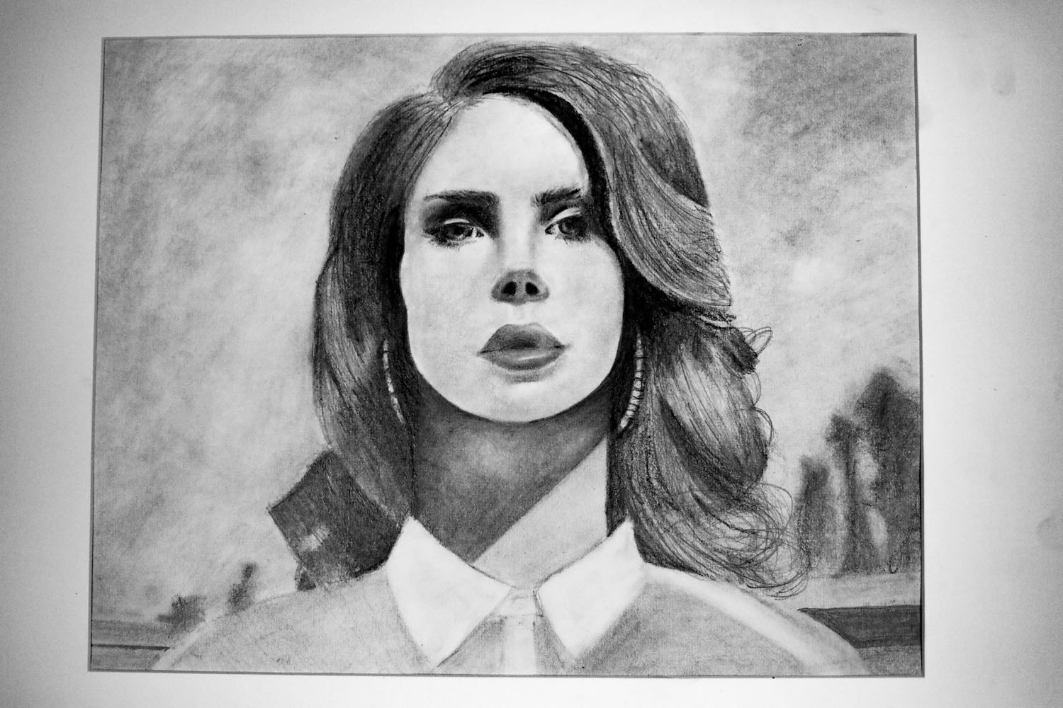 Pencil drawing of a woman in dramatic lighting