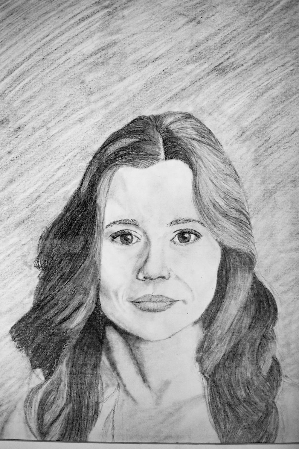 Pencil drawing of woman with wavy hair