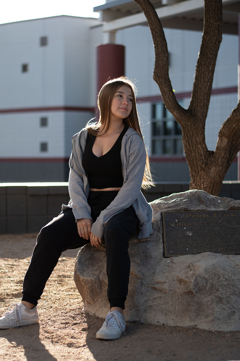 Aidyn Ruiz next to the pride rock