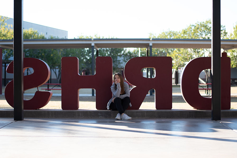 Aidyn Ruiz Leaning on the letters