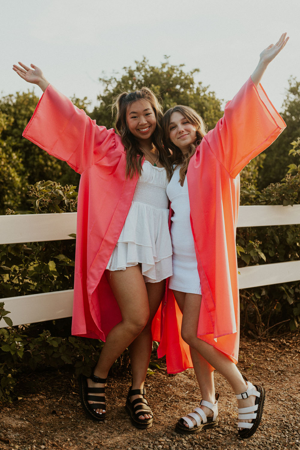 Mady and Belle celebrating their graduation