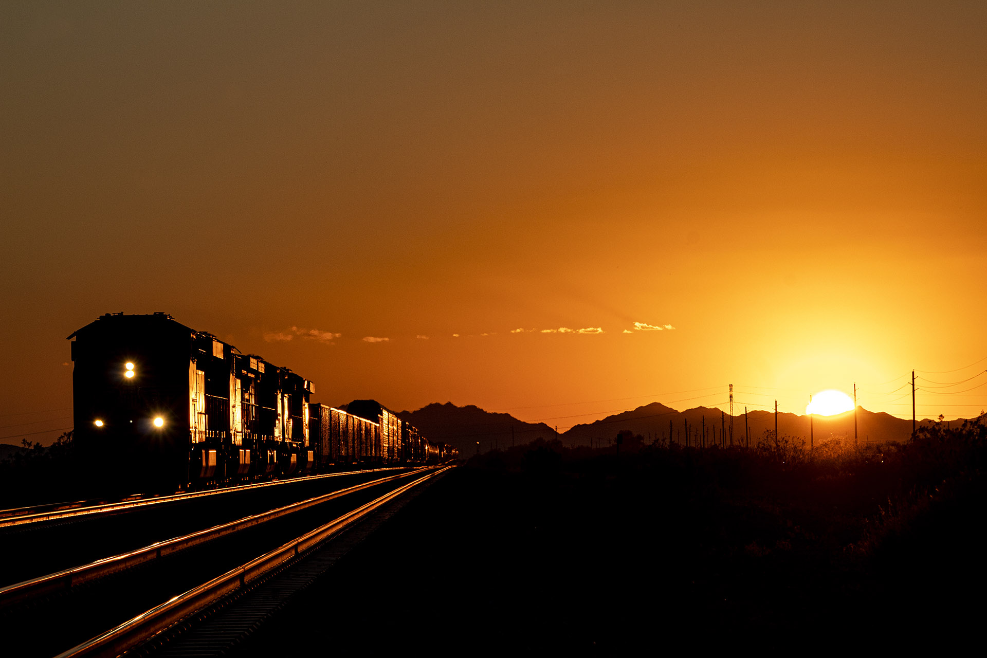 Cesar's picture of a train at sunset