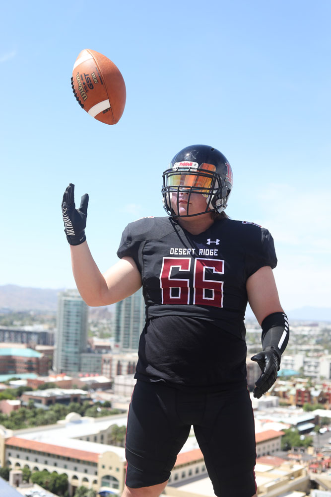 Jaguar Lineman throwing the ball on A mountain in Tempe AZ