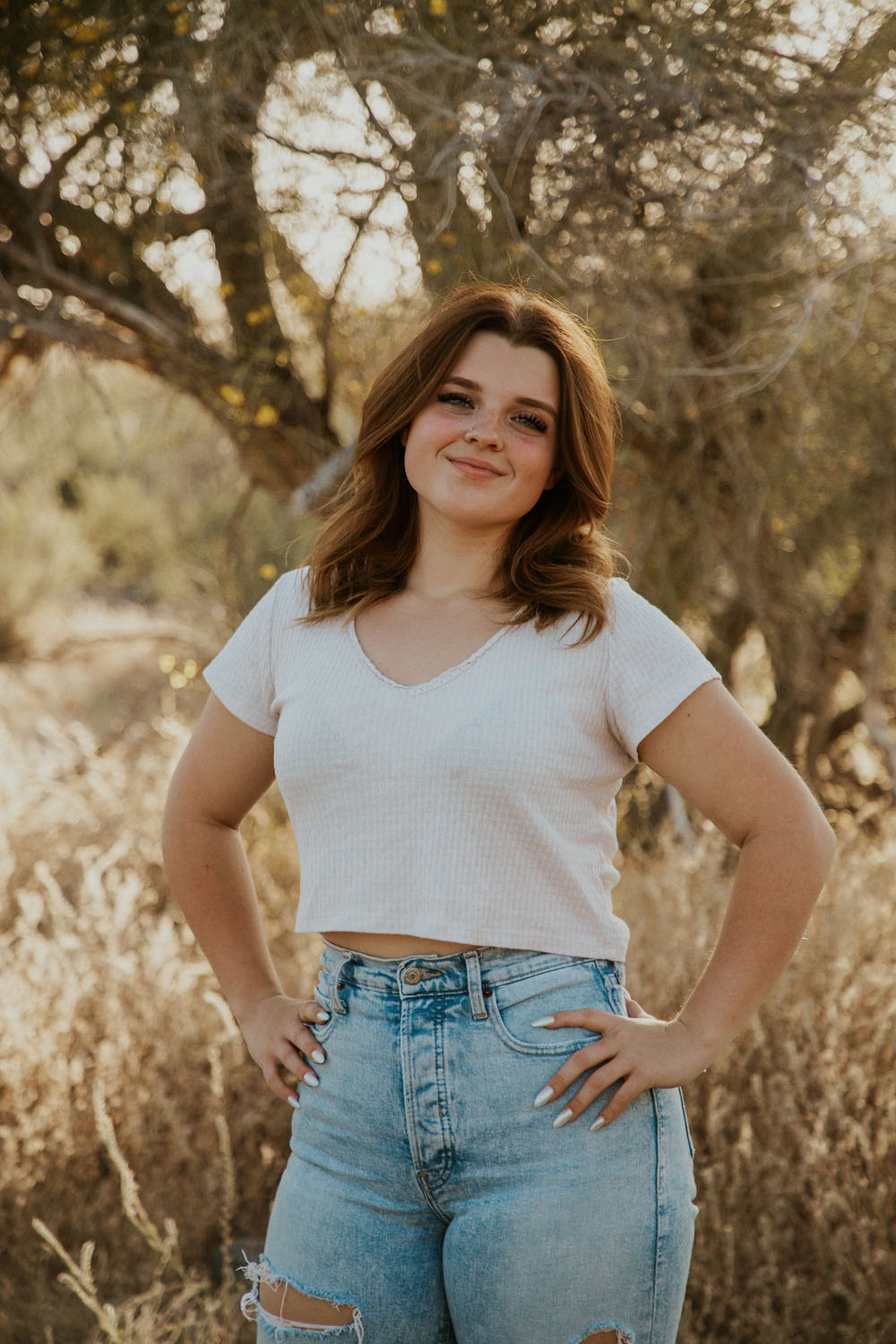 Graduate in the Desert posing