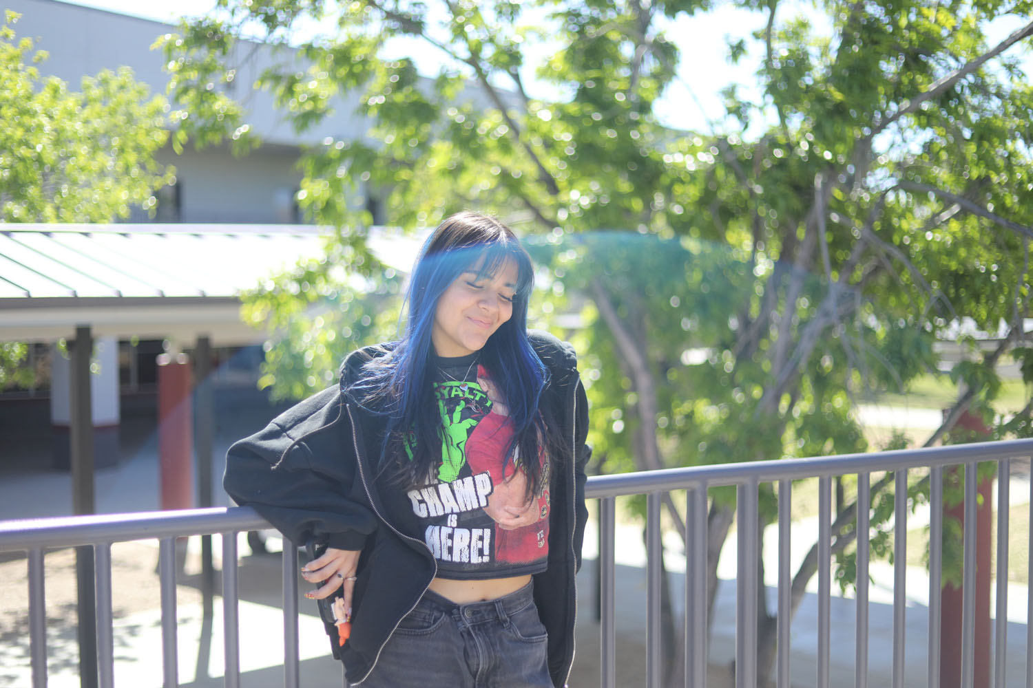 Val on the stairs in the DRHS courtyard