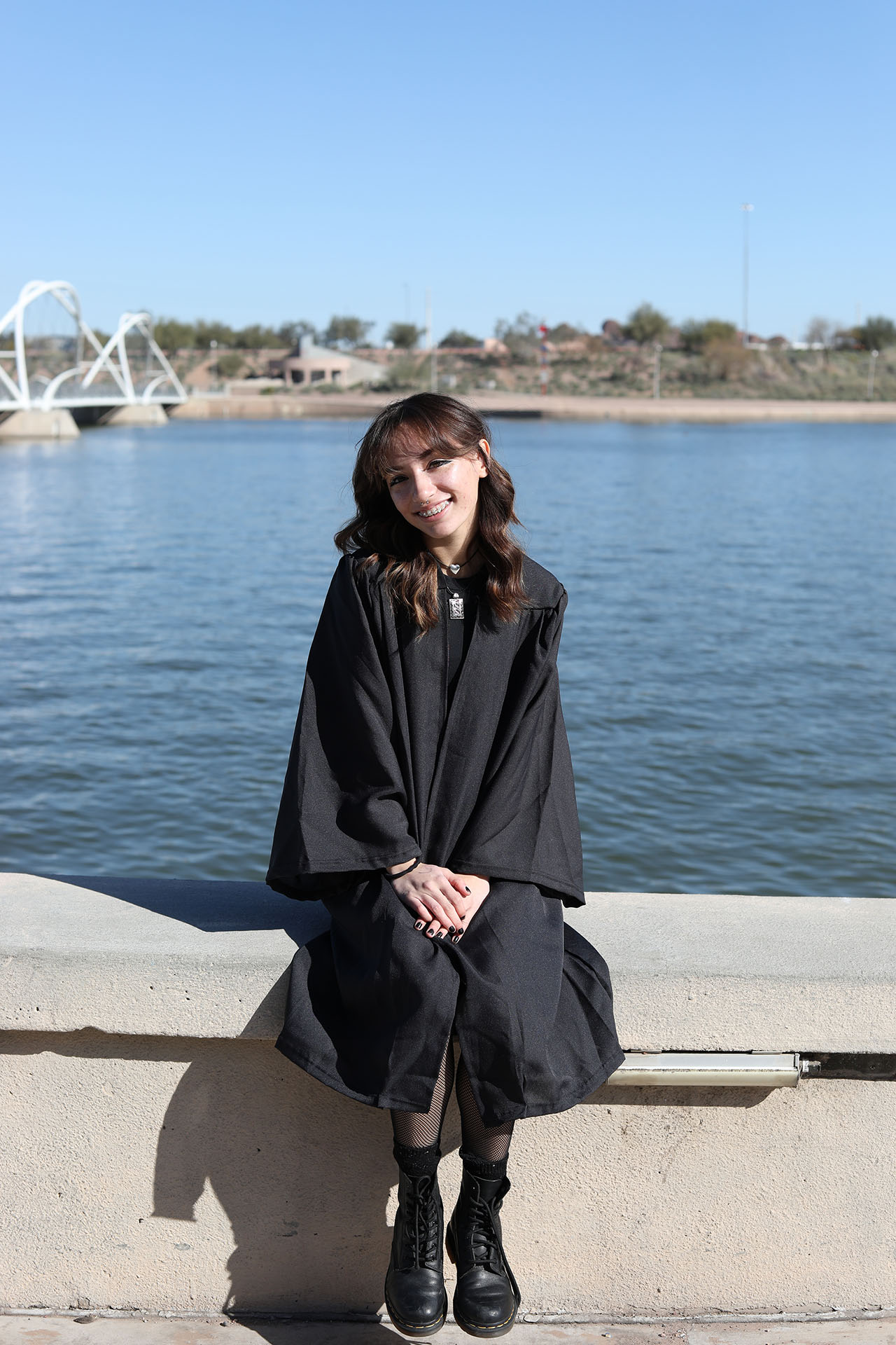 Senior at DRHS in front of Tempe Town Lake