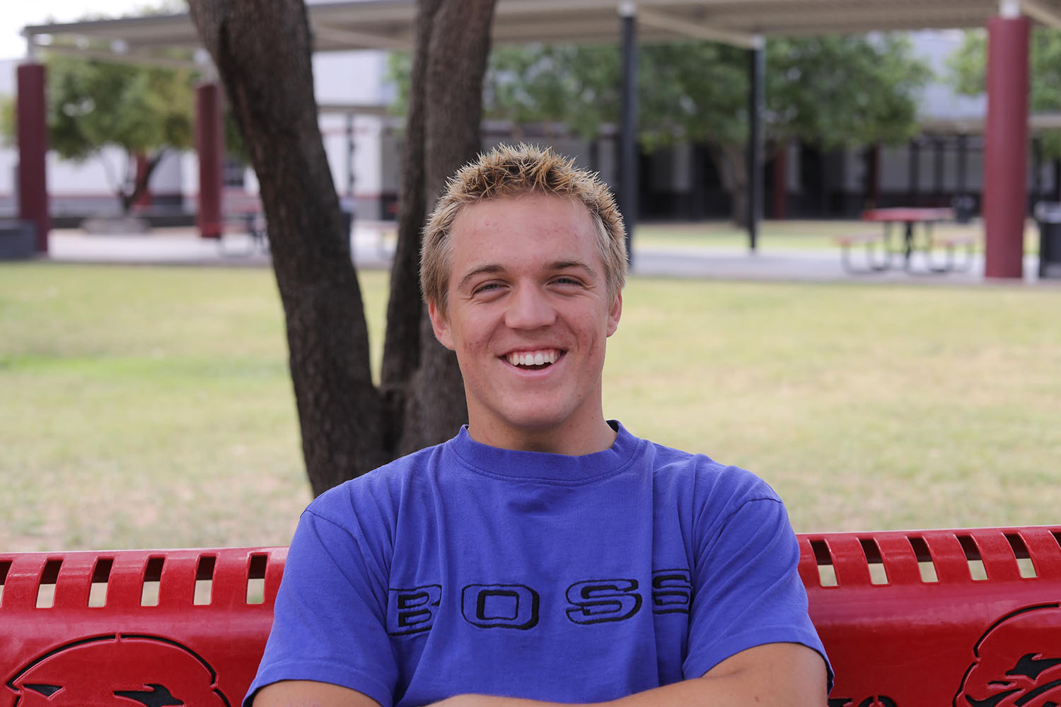 Student smiling in the DRHS courtyard