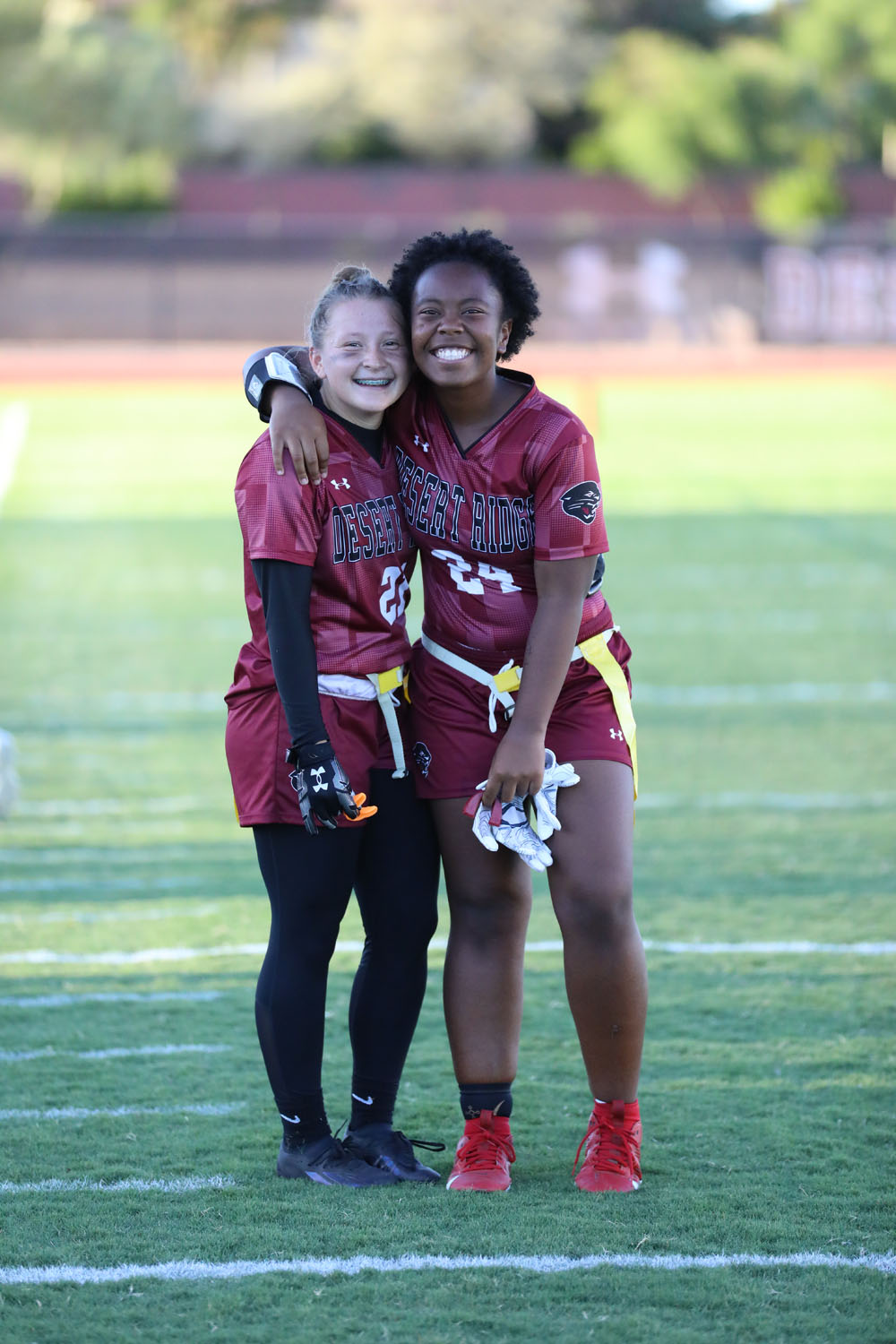 Teammates smiling for the camera