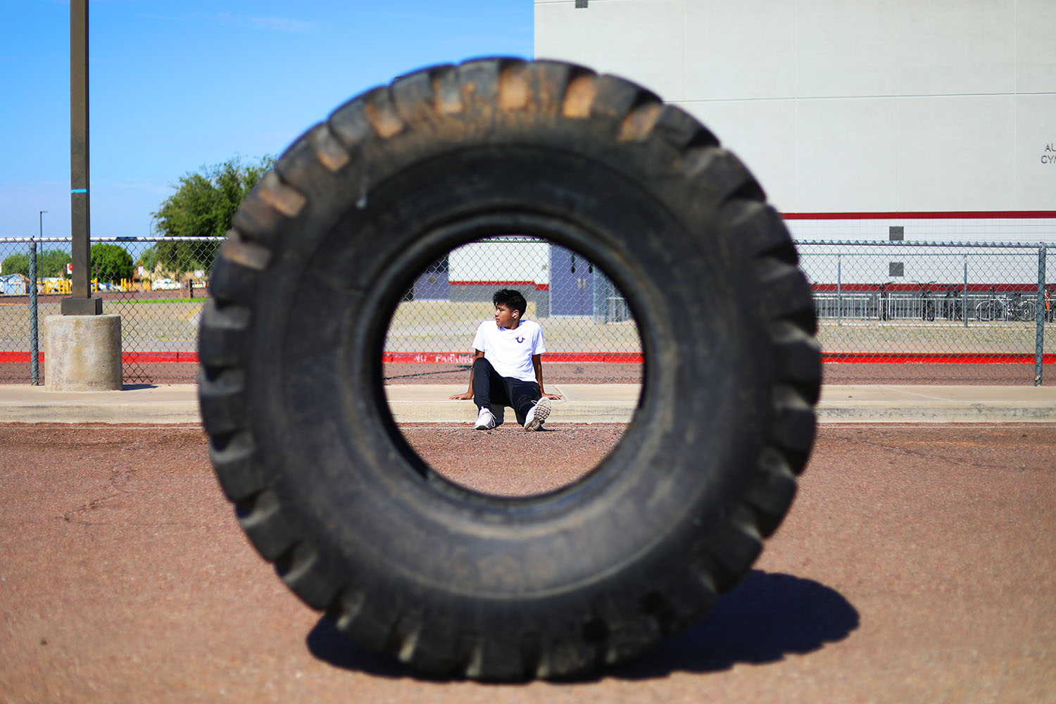 Victor framed by a tire