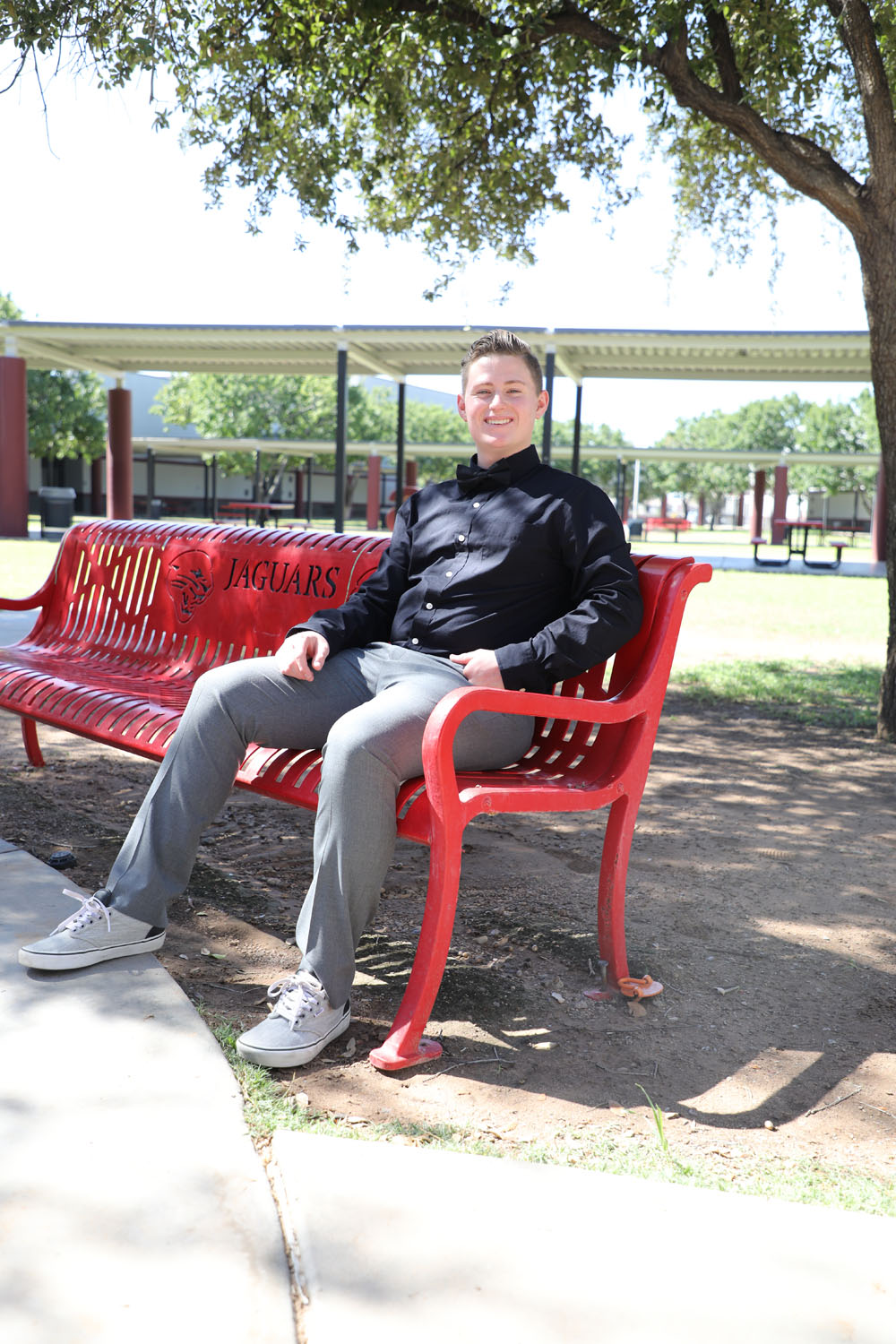 Jayden sitting on a bench