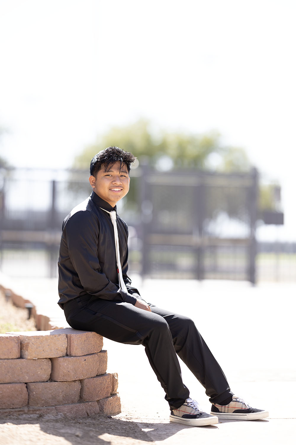 Victor in sunlight smiling