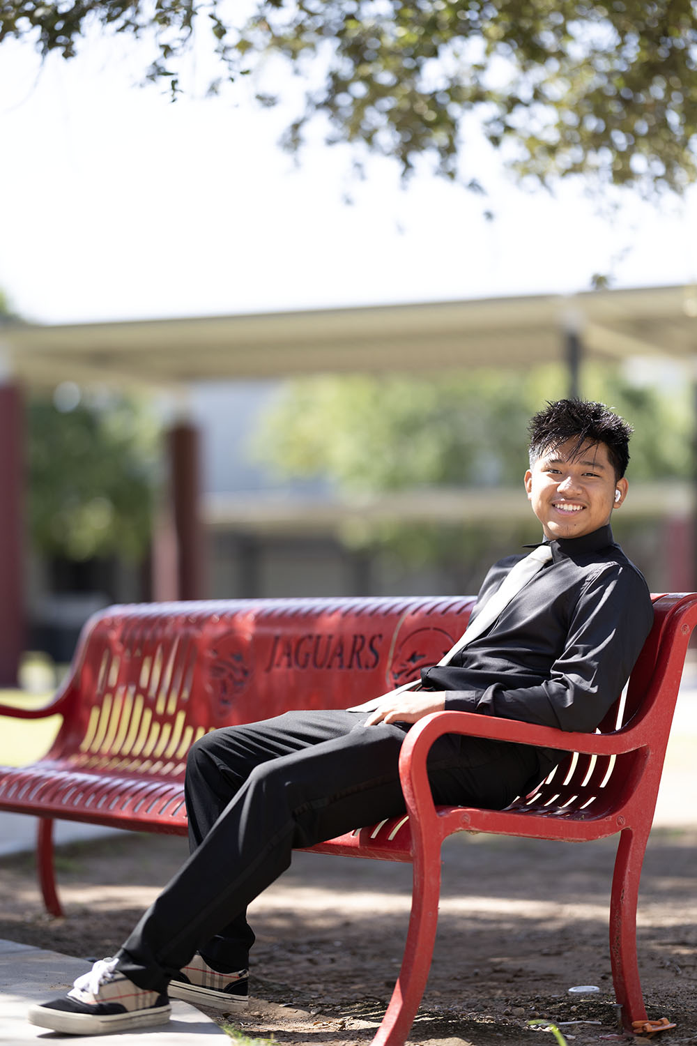 Victor on a bench in the courtyard