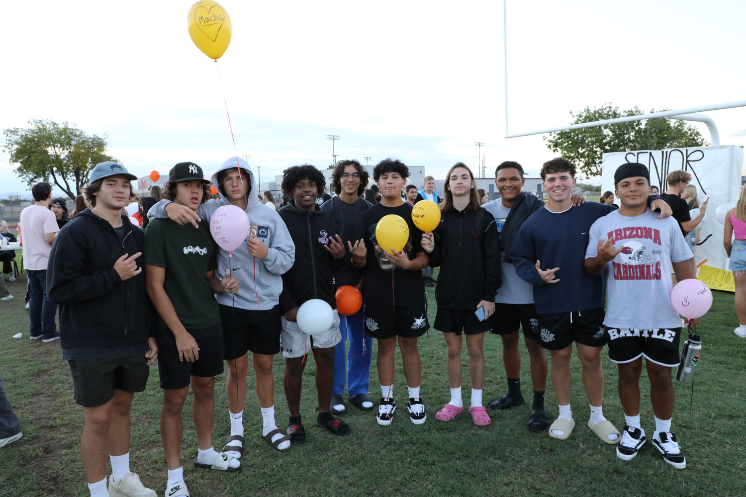 Group of boys at the sunrise