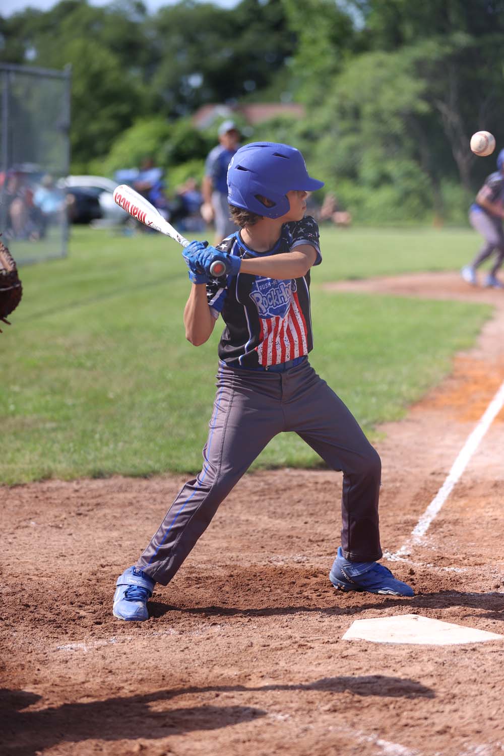 Evan watching a ball go by him