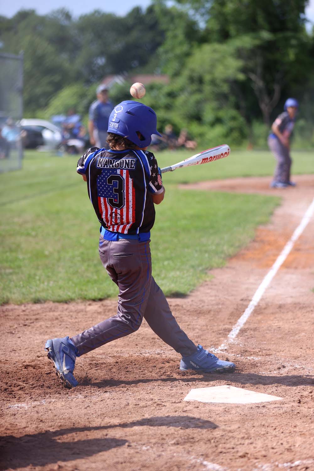 Evan fouling off a pitch