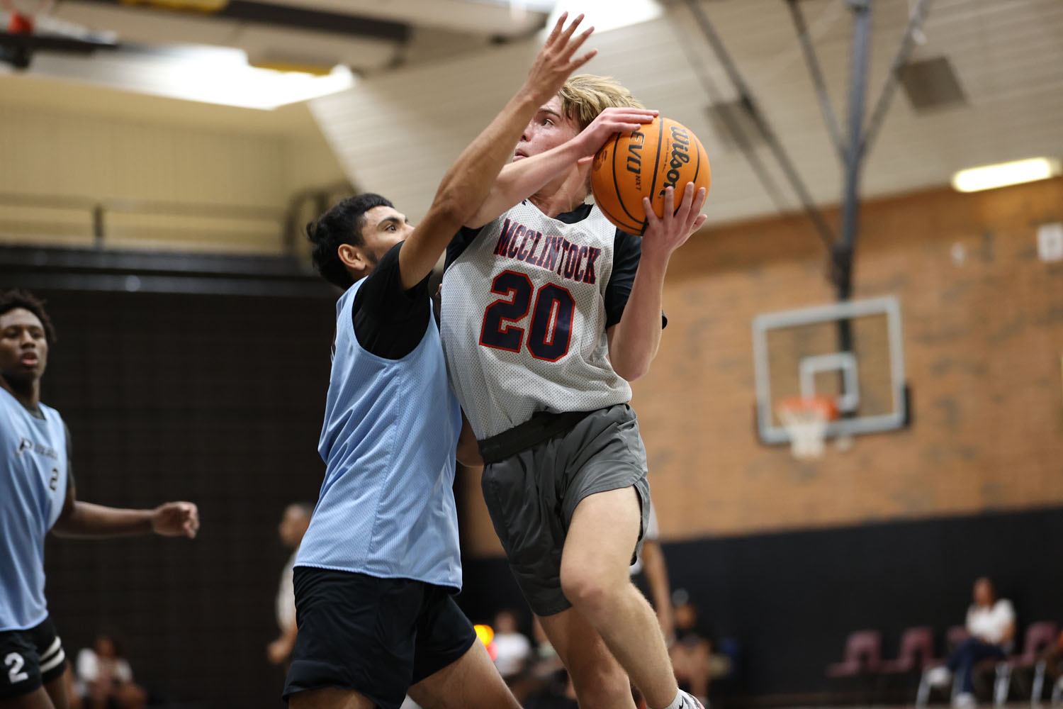 Looking to shoot the ball as he drives the lane