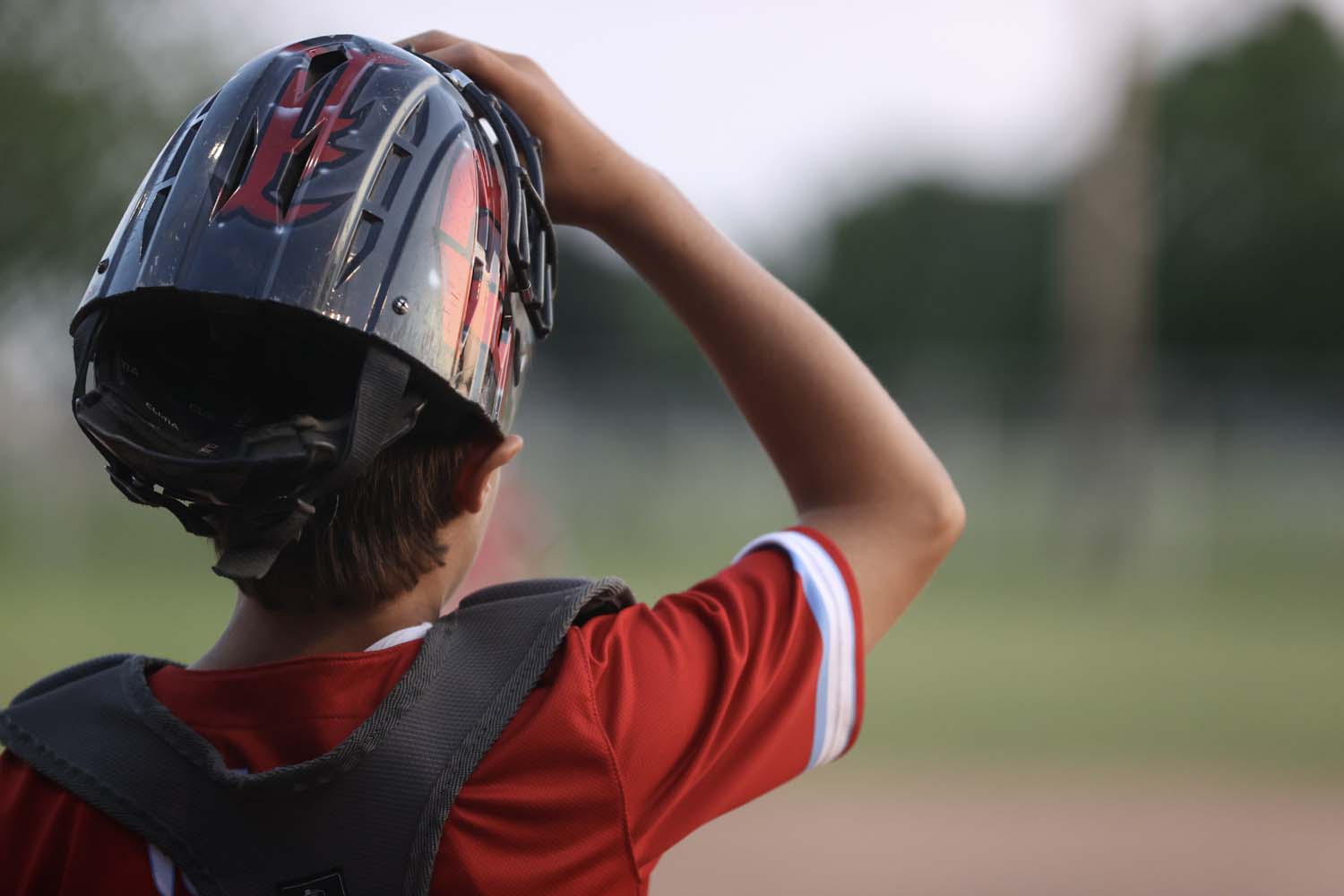 Parker over looking his team from his position at catcher