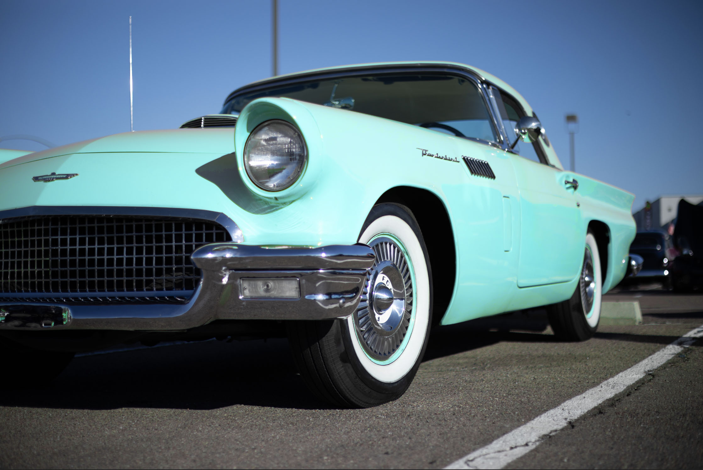 A teal Ford Thunderbird