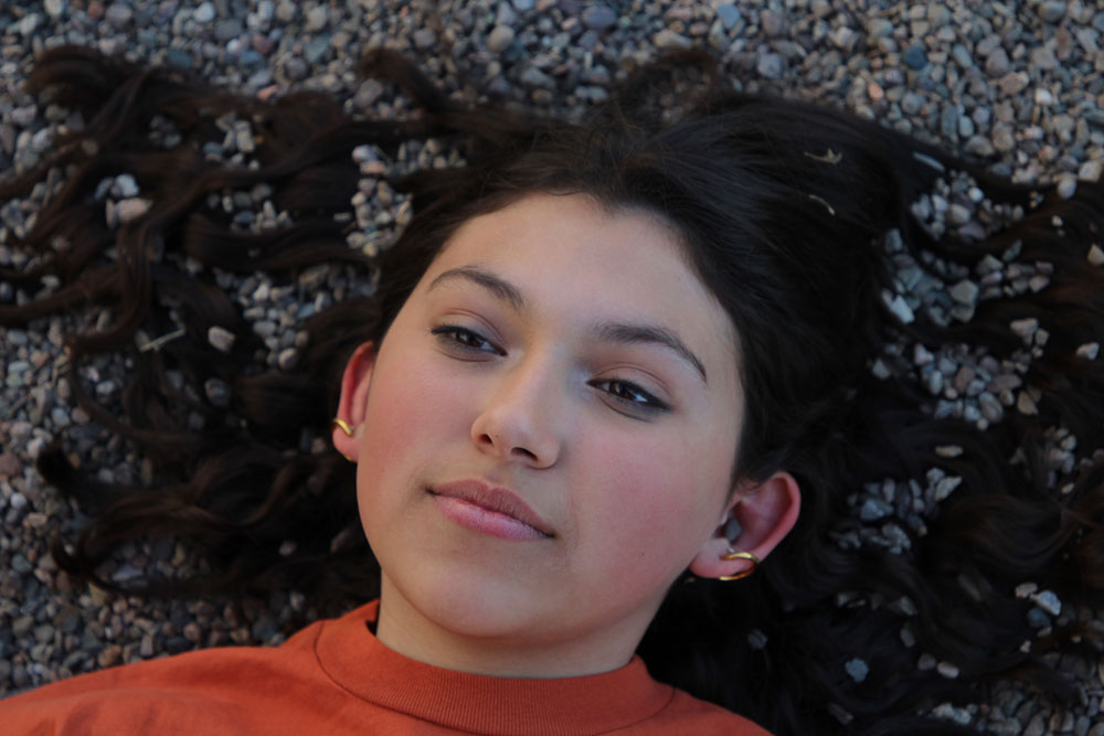 Girl laying on rocks