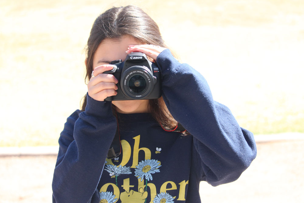 Girl holding camera