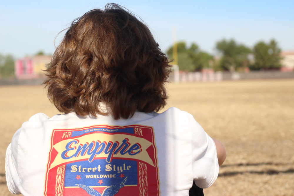 backshot of alex on the football field