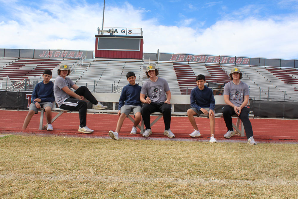 Guys on the Bench at the football field