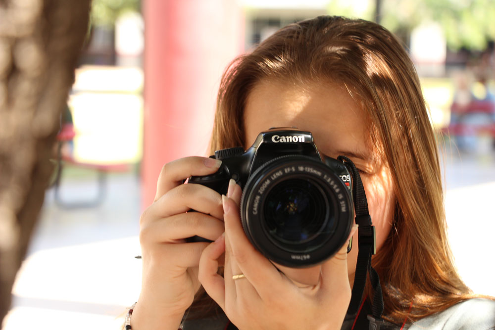 girl taking a picture