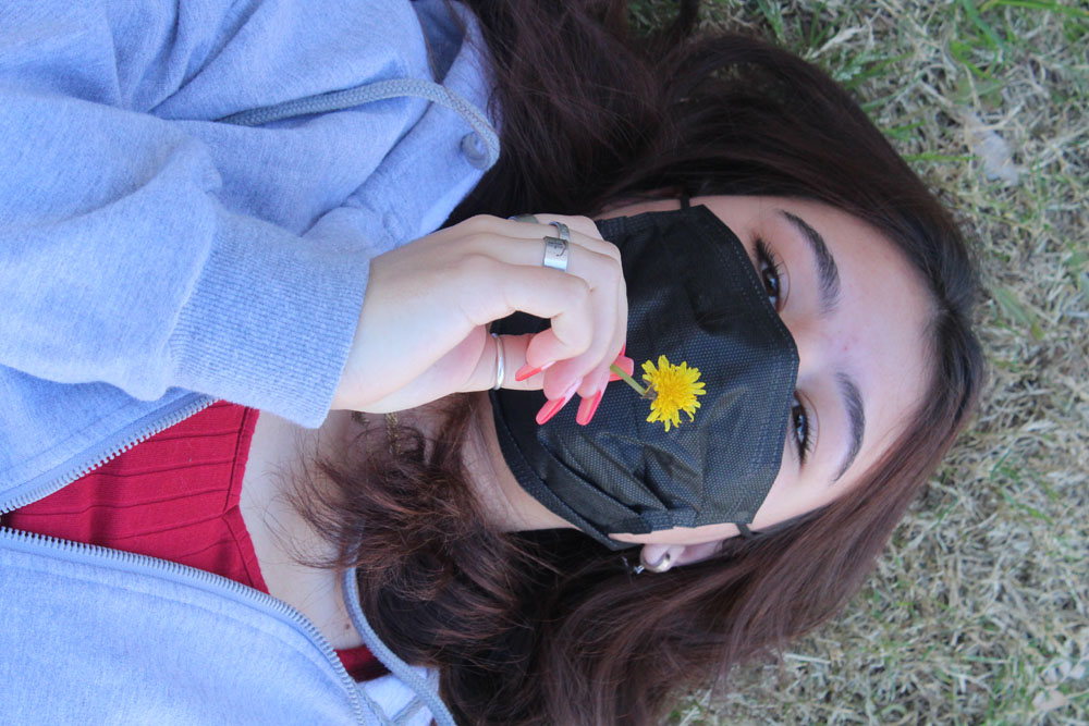 Girl holding flower