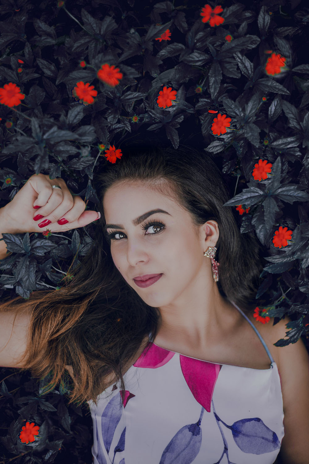 Girl laying in flowers