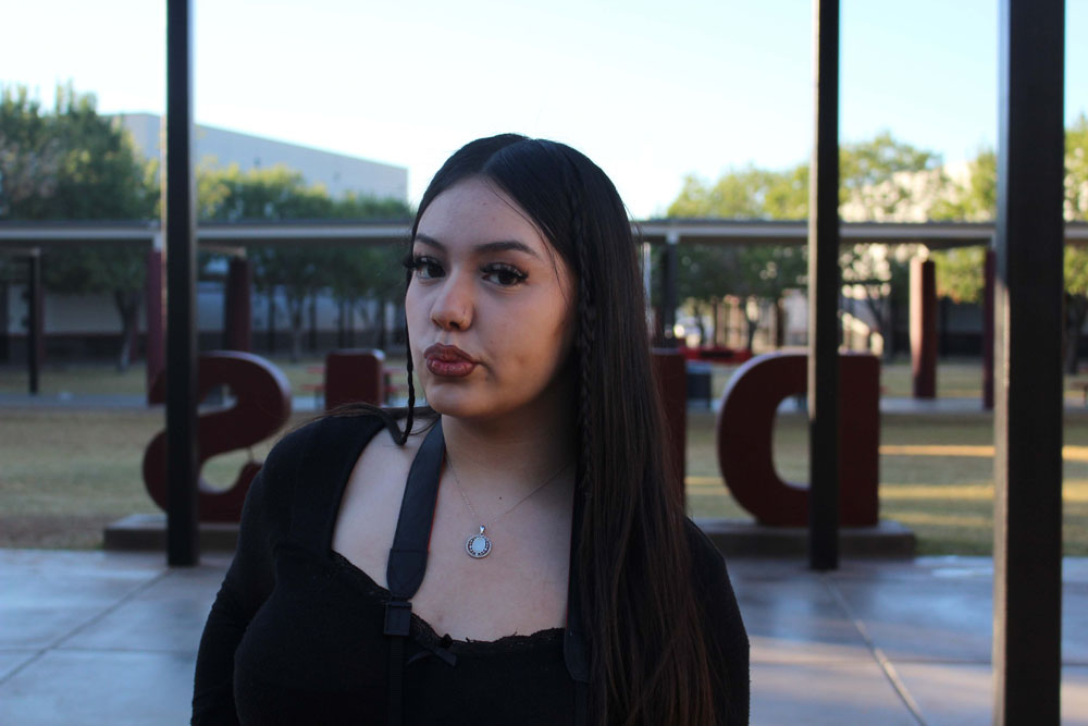 Anesia Posing in Front of DRHS Letters