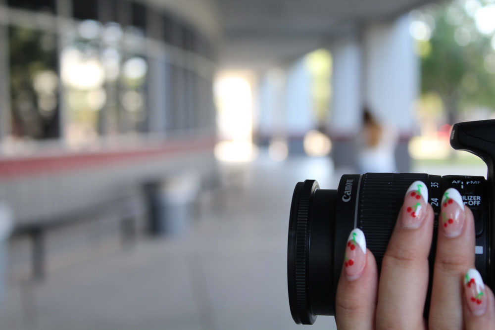 Sofia's Nails on Camera with Blurry Background