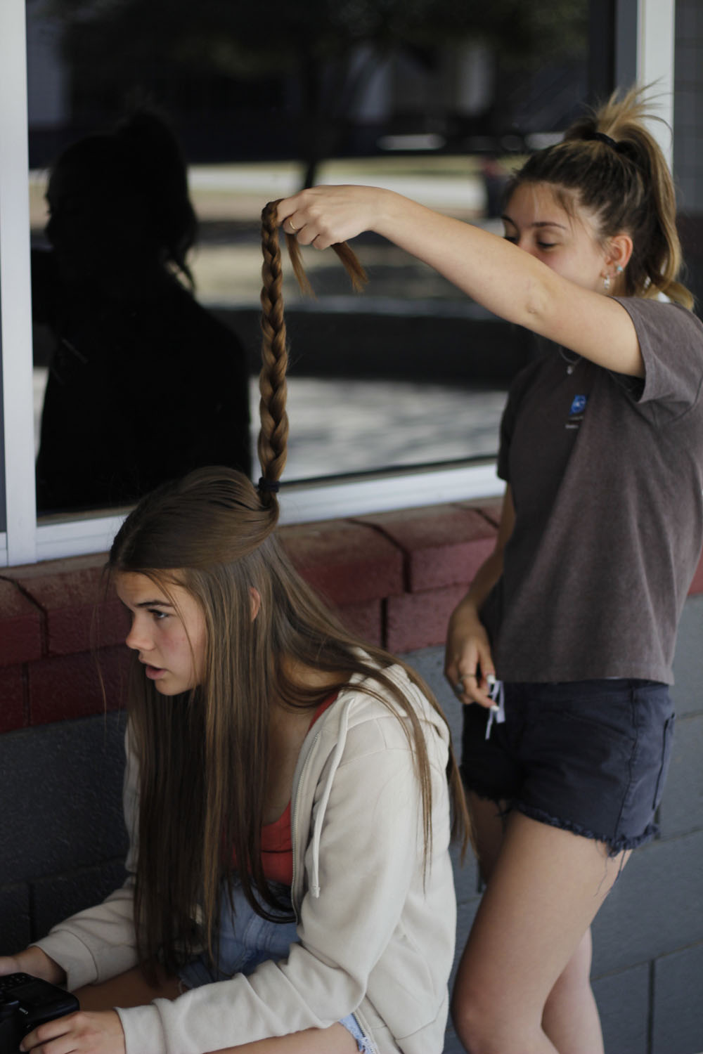 tatum getting braids