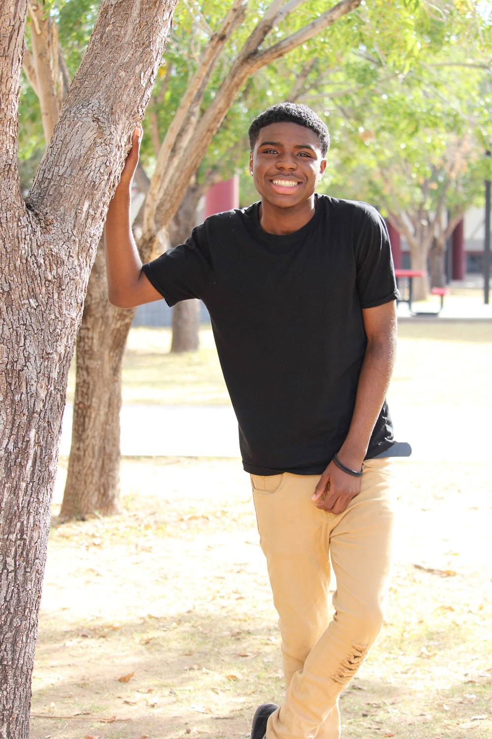 amir next to tree