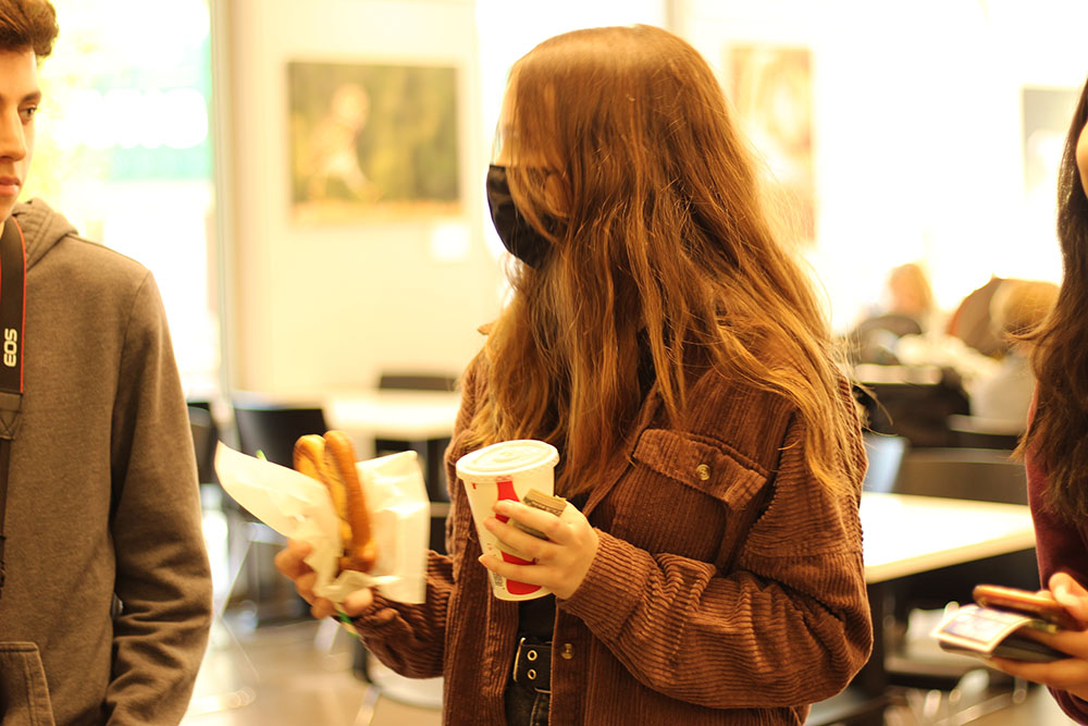 Samantha Sapp holding a pretzel