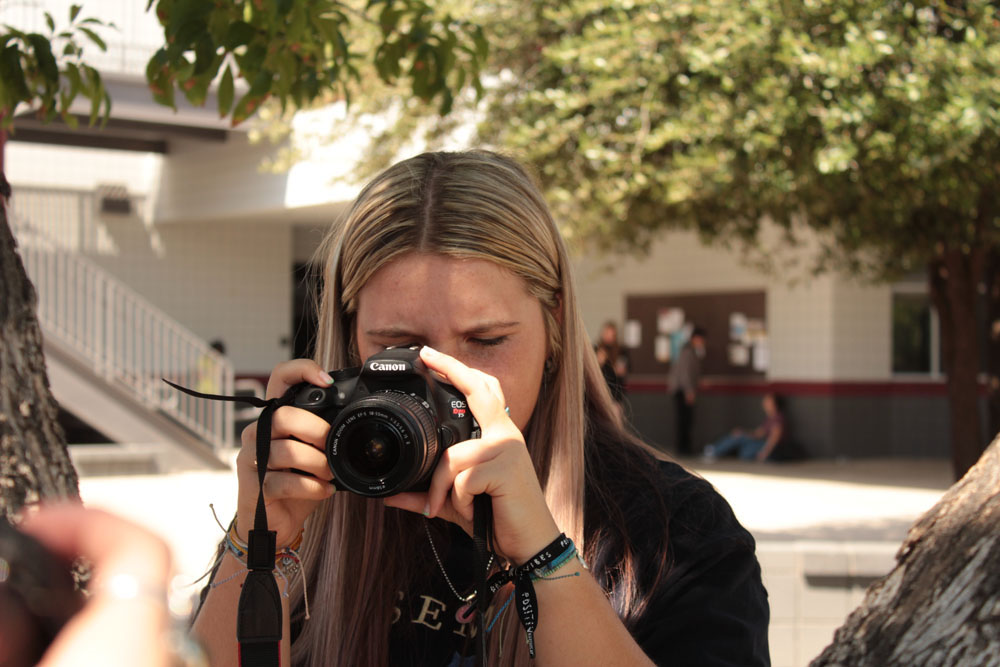 Haleigh looking at her settings