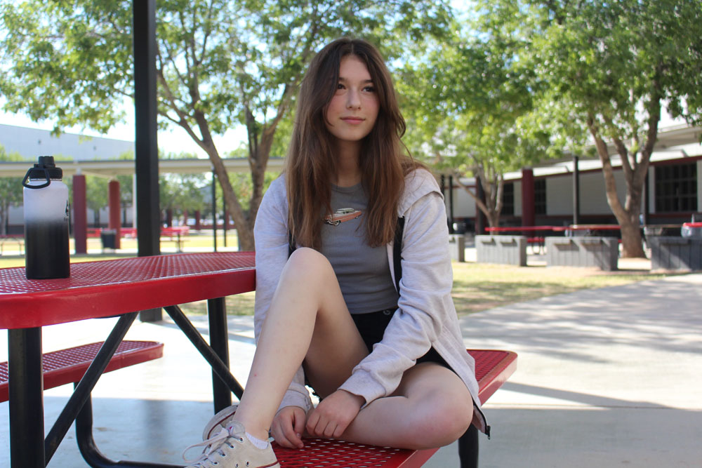 janey-sitting-on-a-bench