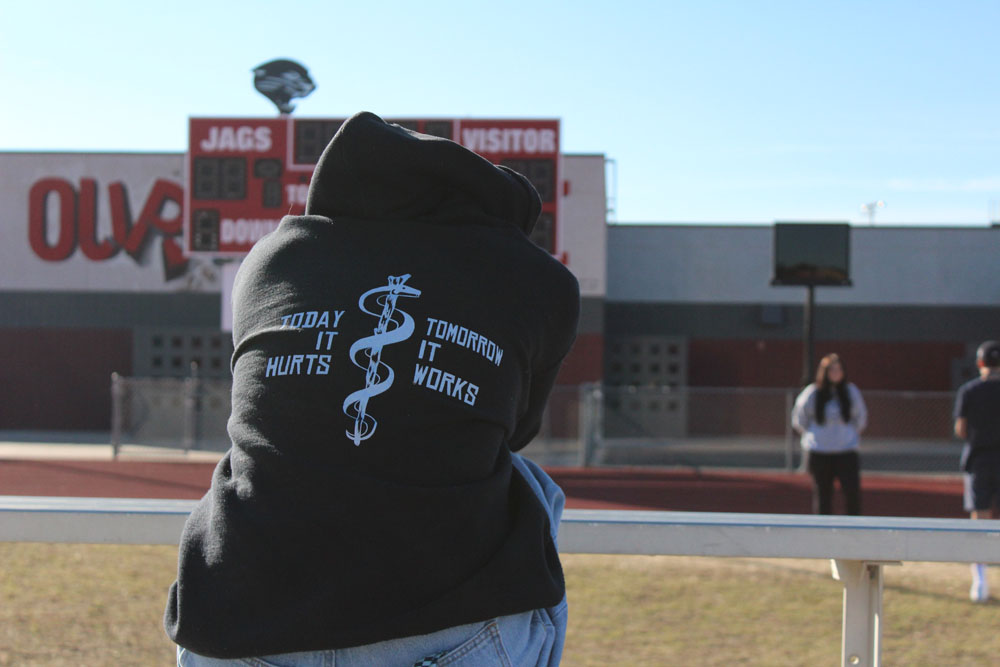 kamry's-sweatshirt-sitting-on-the-bleachers