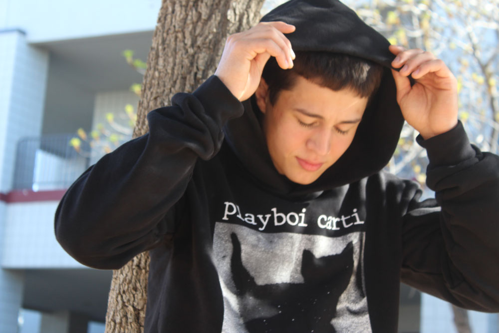 gabe wearing playboi cardi merch