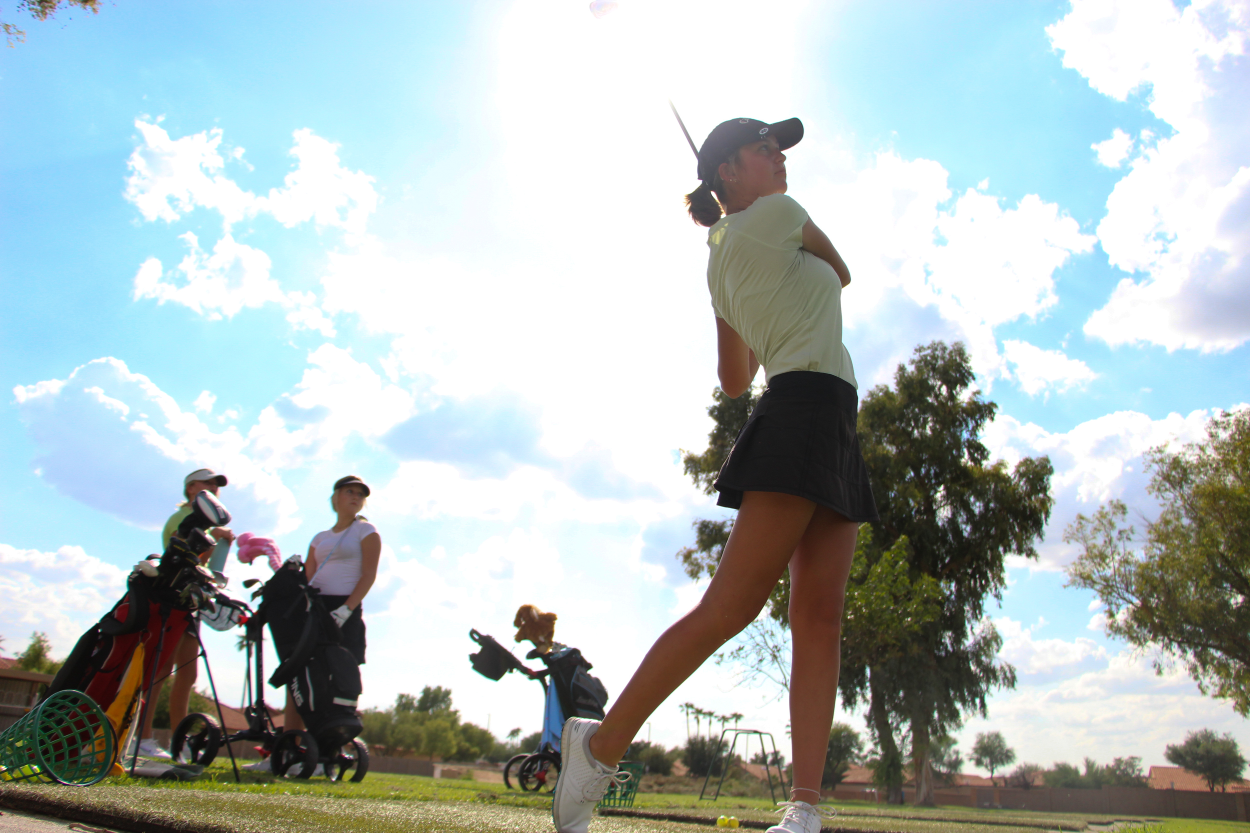 DRHS Ladies Golf watching her shot